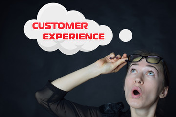 Above the businessman hangs a cloud with the inscription:CUSTOMER EXPERIENCE