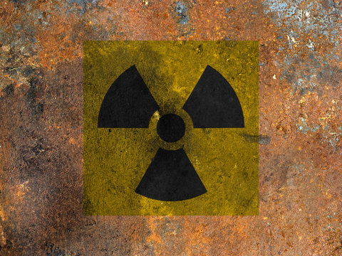 a sign of radiation on a rusty background. 