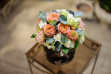 Beautiful vintage box of champagne colour flowers