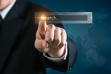 search bar on internet web with a man touching a virtual technology screen