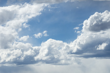 soft white clouds in the blue sky