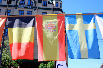Country flags on soccer teams - Belgium, Spain  and Sweden.  