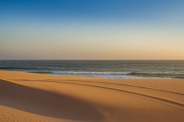 Wild beach at sunset