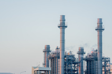 Electricity power plant with morning sky.
