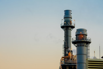 Electricity power plant with morning sky.