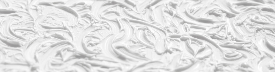 Naklejka premium A beautiful white background is painted with paint with the help of brushes. Texture surface with patterns and strokes, pattern for wallpaper.