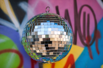 Mirror ball on a colored background