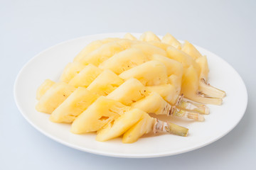 Pineapple slices on white background