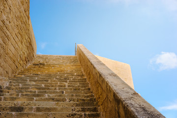 Victoria, Gozo. Ancient walls of Citadel built of limestone with long stairway