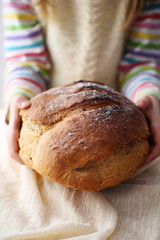 Child holding bread
