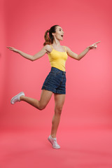 Full length portrait of a happy young girl