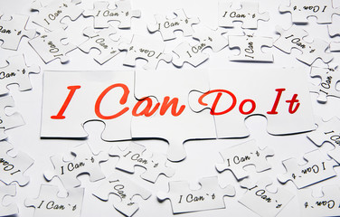 I can do it. Words of motivation. Concept motivational message of ability and possibility. I can`t and i can are written on puzzle pieces.