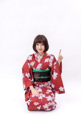 Fototapeta premium 着物 大和撫子 白背景 正座 指差し