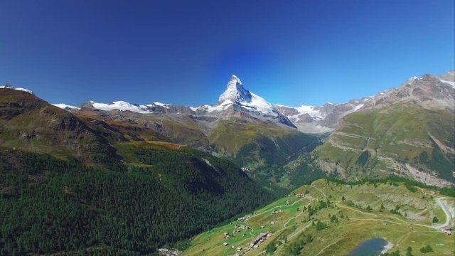 4K Matterhorn Cervin drone shot on a summer day in the swiss alps. European alps, beautiful swiss mountain