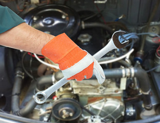 Motor mechanic and spanner