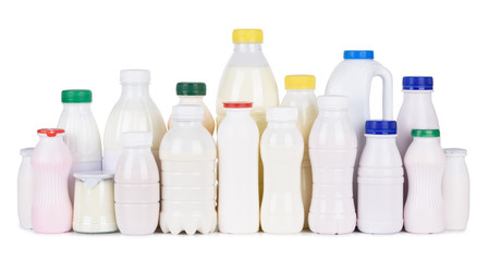 Big set of dairy products in blank retail production packaging bottles isolated on white background. Milk, different yoghurt, kefir, sour cream.