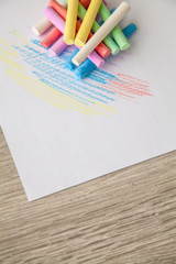 Obraz premium Colorful multi-colored chalk on a white background.