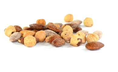 Pile of mixed nuts isolated on the white background