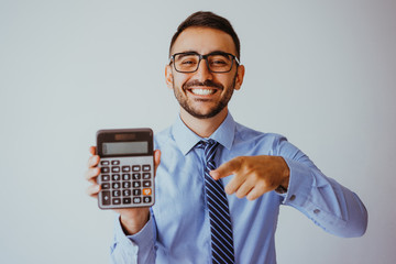 Smiling Business Man Showing Calculator