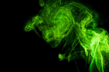 Green smoke on black background