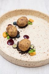 Delicious creative cakes made in the form of real raw potatoes