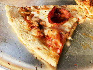 Delivery delicious pizza. Pizza to order. Pizza on an iron tray
