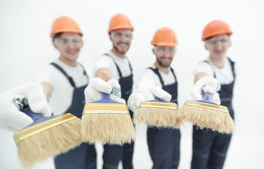 group of builders with different tools
