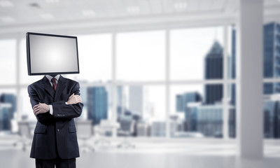 Businessman with TV instead of head.