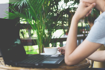 Human hands of a business working whit coffee cup