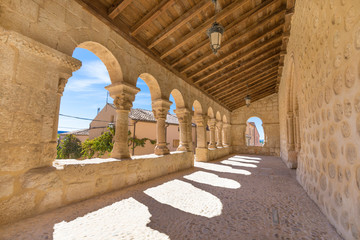 Fototapeta premium portico gallery in church San Miguel (Saint Michael), romanesque style landmark and public monument from eleventh century, in San Esteban de Gormaz, Soria, Spain, Europe 