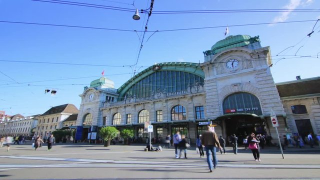 4K Timelapse trainstation - commuters entering in the station. Dynamic western City & commuters