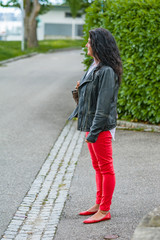 Lady in red and black leather