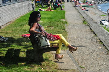 Woman on a bench in High Heels