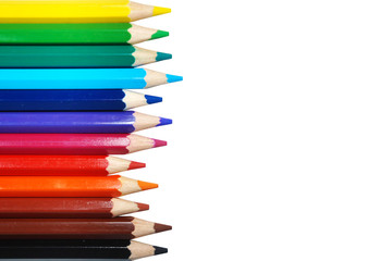 Color pencils isolated on white background. Art and hobby concept card, empty space for text, top view