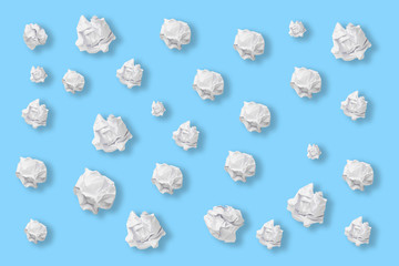 Folded paper as clouds over blue background