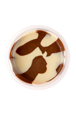Chocolate paste in a plastic jar. Chocolate - milk paste in a plastic container on a white background.