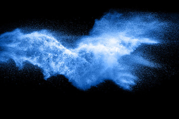 blue particles splash on black background