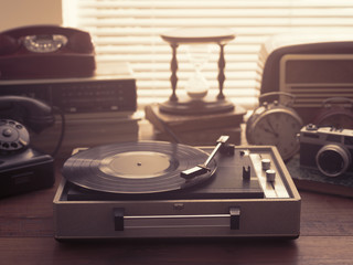 Vintage objects collection next to a window