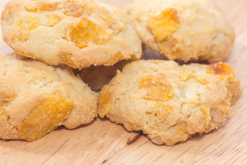 pile of Oatmeal cookies on wooden plate