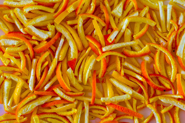 Finely chopped peel of mandarins. Background. Close-up.
