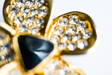 Blurred abstract art closeup with selective focus of beautiful attractive shiny beads in a fashion and handicraft accessory concept. Different elegant handmade jewellery gem necklace background