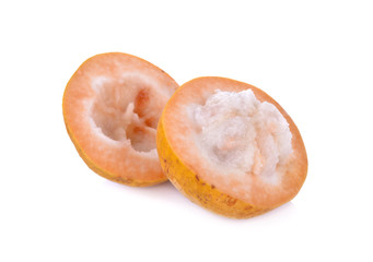 half cut ripe santol on white background