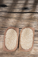 quinoa beans in bowl on rustic wooden background