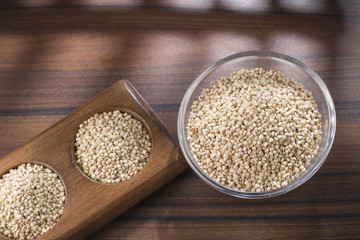 quinoa beans in bowl on rustic wooden background