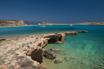 Crystal clear waters of Pori beach at Koufonisi island in Greece