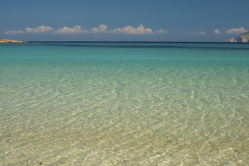 Crystal clear waters of Pori beach at Koufonisi island in Greece