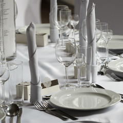 Detailed closeup of tableware, cuttlery and wedding decorations