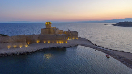 Aerial view of Aragonese Fortress at sunset, Le Castella - Italy