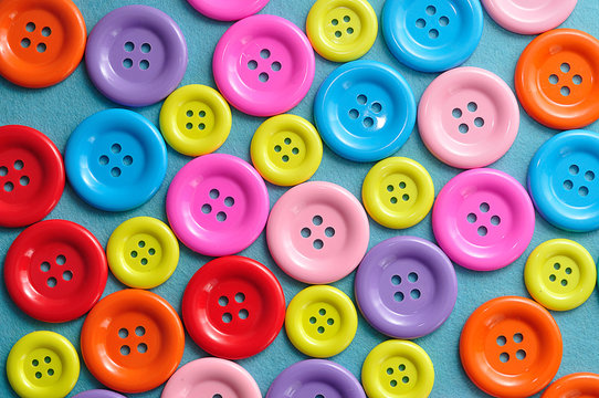 A full frame of colorful buttons for sewing