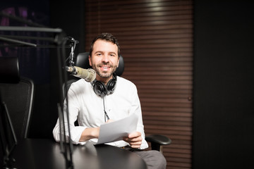Young guy working as radio host